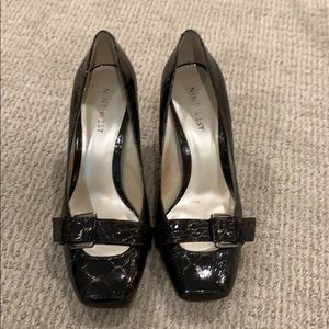 Dark brown patent leather shoe